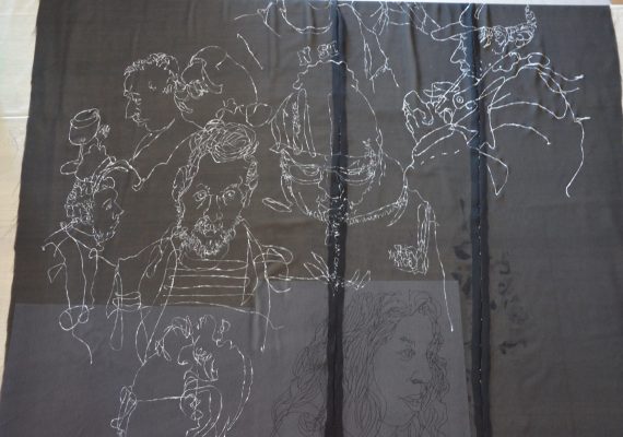 Black dress with hand made drawn white figure design V.